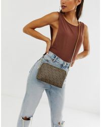 DKNY Bryant Dome Crossbody Bag In Multi Logo - Brown