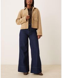 ASOS - Jean ample évasé à taille haute - brut délavé - Lyst