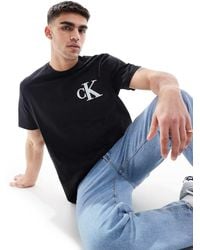 Calvin Klein - Camiseta Negra Holgada Con Parche Del Logo De - Lyst