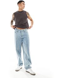 ASOS - Jeans ampi lavaggio chiaro con fascia - Lyst
