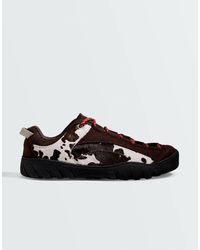 Oysho - Baskets imprimé animal noir, blanc et marron - Lyst