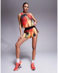 Nike - Aeroswift Dri-Fit Plisse Mid Rise 3 Inch Printed Shorts - Lyst