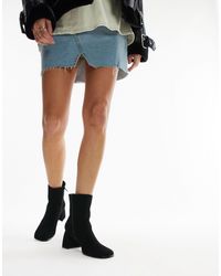 TOPSHOP - Botas negras estilo calcetín con tacón acampanado nina - Lyst