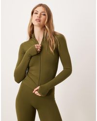 ASOS - Naadloze Geribbelde Top Met Lange Mouwen En Ritssluiting - Lyst