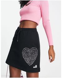 Love Moschino Mini skirts for Women - Up to 75% off | Lyst