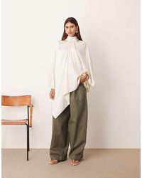 ARRANGE - Satin Overlayer Cape Top - Lyst