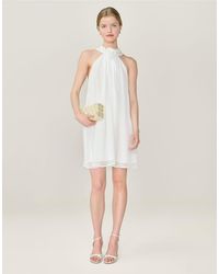 OMNES - Dresses Demi Chiffon Mini Dress With Rosette Detail - Lyst