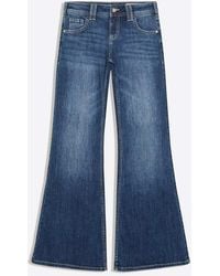 Bershka - Embroidered Low-Rise Flared Jeans - Lyst