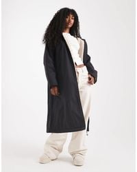 ASOS - Longline Fleece Lined Rain Coat - Lyst