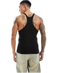 ASOS - Camiseta negra sin mangas ajustada con espalda - Lyst