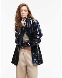 Rains - Chaqueta Corta Azul Marino Brillante Impermeable Con Cremallera 12010 De - Lyst