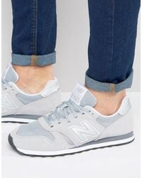 new balance heren gouden