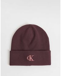 Calvin Klein - Monogramm-rippstrick-beanie mit rosa logo - Lyst