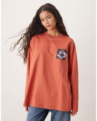 ASOS - Oversized Long Sleeve Top With Floral Back Graphic - Lyst