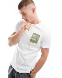 Calvin Klein - Camiseta con recuadro del logo superpuesto - Lyst