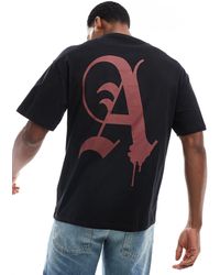 ADPT - T-shirt oversize nera con stampa "a" sul retro - Lyst
