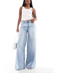 ASOS - Vaqueros De Pernera Ancha Con Lavado Claro Y Cinturón Trenzado De -Azul - Lyst