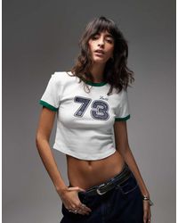 Levi's - T-Shirt Taglio Corto Bianca Con Grafica Centrale E Bordi A Contrasto - Lyst
