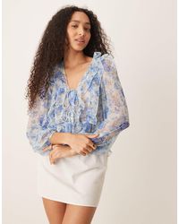 Mango - Tie Detail Long Sleeve Flouncy Floral Print Blouse With Ruffle Detail - Lyst
