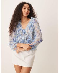 Mango - Tie Detail Long Sleeve Flouncy Floral Print Blouse With Ruffle Detail - Lyst