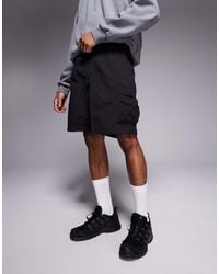 The North Face - Pantalones Cortos Cargo Negros Con Logo En El Bolsillo De - Lyst