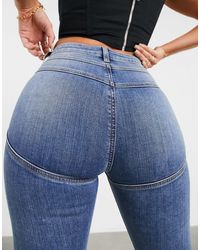 ASOS – lift and contour – figurformende powerstretch-jeans mit engem schnitt - Blau