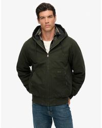 Superdry - Canvas Surplus Hooded Jacket - Lyst