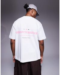 The Couture Club - T-shirt oversize avec logo rose imprimé sur la poitrine et au dos - Lyst