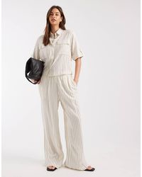 Aware - – gestreifte hose aus leinenmix - Lyst