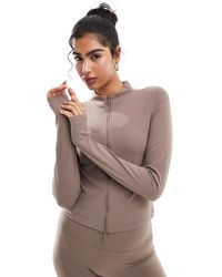 Nike - Top De Manga Larga Con Cremallera De Tejido Suave Dri-Fit Zenvy De - Lyst