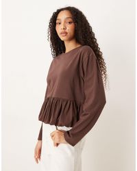 ASOS - Bubble Peplum Hem Long Sleeve Top - Lyst