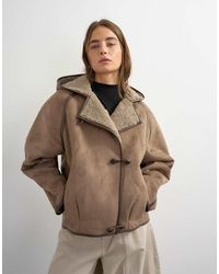 TOPSHOP - Hooded Shearling Toggle Detail Jacket - Lyst