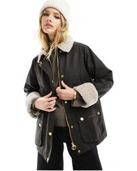Barbour - Swainby - veste cirée avec col pelucheux - à carreaux écossais - Lyst