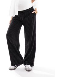 ASOS - Pantalones negros a rayas blancas sin cierres - Lyst
