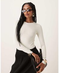 ASOS - Naadloze, Corrigerende Body Met Lange Mouwen En Ronde Hals - Lyst