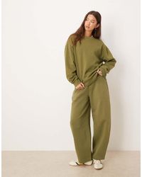 ASOS - Brushback Joggingbroek Met Wijde Ronde Pijpen - Lyst