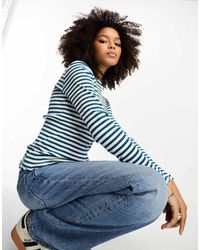 Vila - Geribbeld Gestreept T-Shirt Met Lange Mouwen En Golvende Rand - Lyst