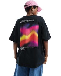 Converse - Camiseta negra con estampado colorido - Lyst
