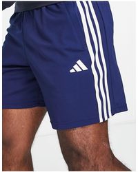 adidas Originals - Pantalones cortos con 3 rayas train essentials - Lyst