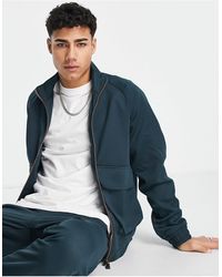 river island iridescent puffer jacket with funnel neck in oil slick