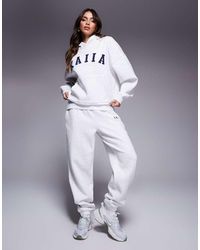 Kaiia - Cotton Blend Embroidered Logo Cuffed Trackies - Lyst