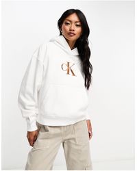 Calvin Klein - Sudadera blanca con capucha y logo premium - Lyst