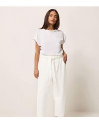 PixieGirl - Petite Belted Barrel Jeans - Lyst