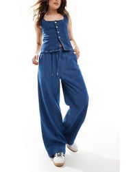 New Look - Pantalon ample à enfiler en denim - moyen - Lyst