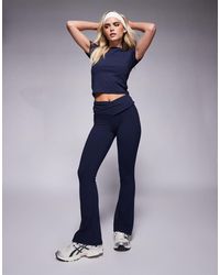 4505 - Petite Slim Kick Yoga leggings With Wrap Waist - Lyst