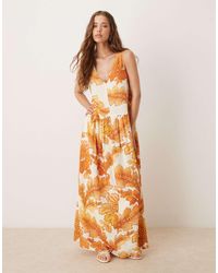 ASOS - Robe longue à taille basse et dos nu en lin avec imprimé - orange - Lyst