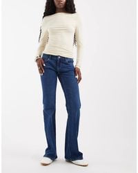 ONLY - Vaqueros Acampanados De Talle Muy Bajo En Denim - Lyst