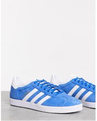 mens blue gazelle trainers