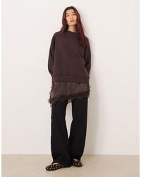 ASOS - Oversized Sweatshirt With Peek A Boo Satin And Lace Mix Cami - Lyst