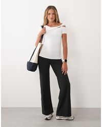 4505 - Plush Handle Asymmetric Drape Detail Cap Sleeve Studio Top - Lyst